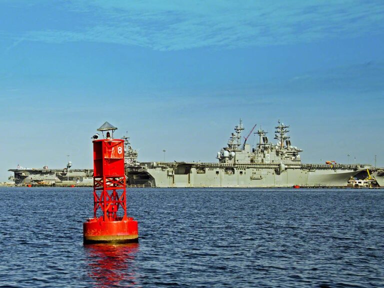 Red buoy and battleships