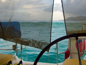 Breaking wave at anchor