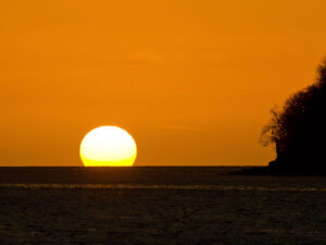 Sun dropping into the sea