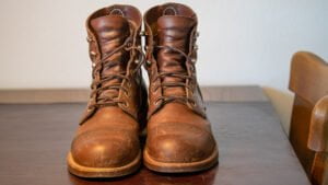 Red Wing iron Ranger boots, lightly scuffed, on a table