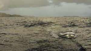 Departing the Virgin Gorda North Sound bound for St. Martin while towing the dinghy behind me