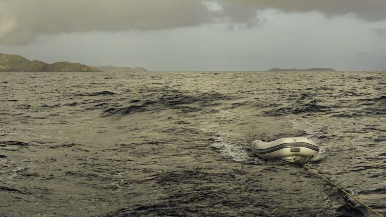 Departing the Virgin Gorda North Sound bound for St. Martin while towing the dinghy behind me