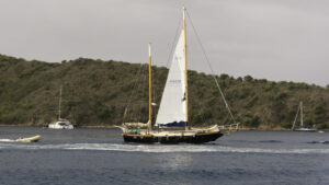 Michael Beans' yacht, "Mangele" underway in the Bight on Norman Island.