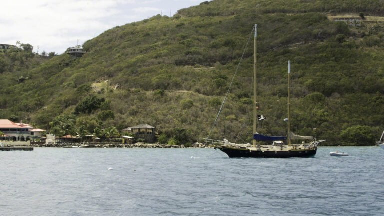 Mangele, Michael Beans' ketch, moored just off Leverick Bay