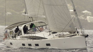 Serenity is sailing upwind in wind and rain, but still making more speed than the other boats thanks to the size of the Jeanneau 64 as well as the professional helming by Gary Jobson