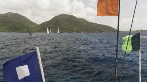 The Green/Green class flag, the attention and the orange start line flag