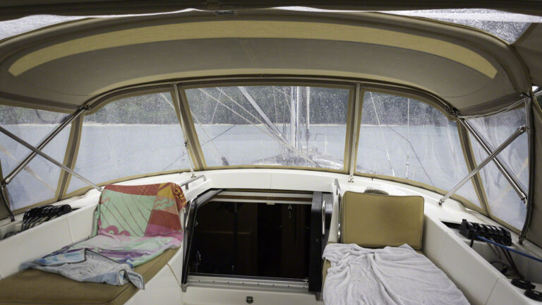 The colorful beach towel is my usual resting place, but the rain coming down made it into my shelter today and got the towel wet