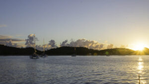 While the waters look calm, there's a long swell coming into the bay which is rocking the boats on my side of the anchorage