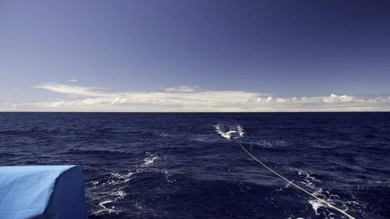 The island of St. Martin is way behind me, invisible but for the clouds it generates.