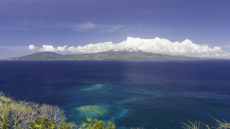 Bright colors and cloud-covered hills on  Basse Terre on Guadeloupe