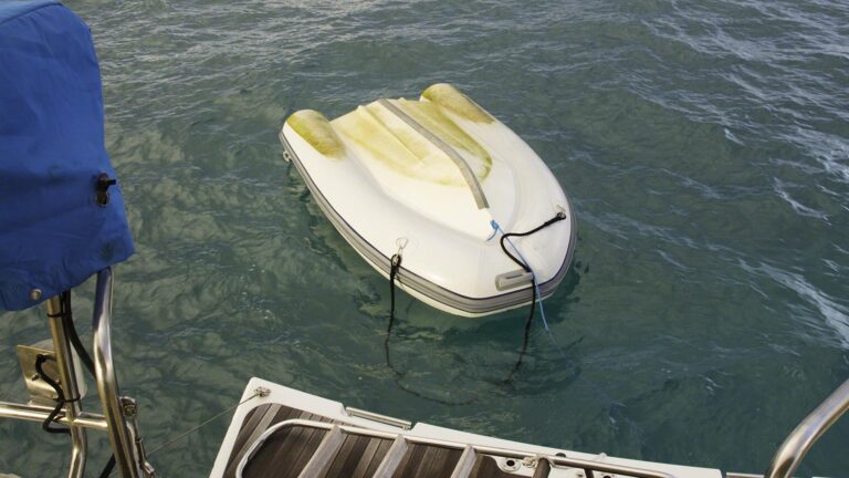The strong and gusty winds had managed to turn the dinghy over at night, and getting it right-side-up with the engine still attached was a bigger effort than I'd thought.
