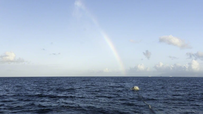 Rainbow over my dinghy
