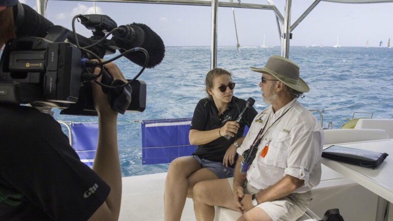 The media representatives aboard are interviewing our Race Officer, Rob, about the racing