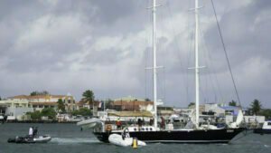 The skipper of this big heavy boat ran aground hard (evidently she hadn't looked at the chart or depth sound) and it took 3 tenders an hour to pull her off. Then they had various attempts at anchoring, including one next to me, which weren't working as the boat was in the middle of the channel. I saw them put out fenders so perhaps they opted to go to a dock