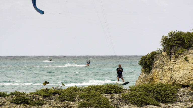 Kitesurfing coming in to the beach