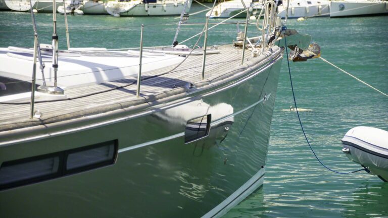 A liberal washing with AwlWash followed by a chamois cloth to make the hull reflect again