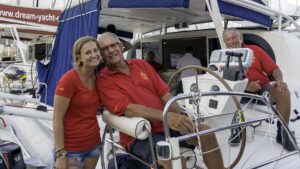 Relaxing aboard the committee boats after the day's work; Daphne, Hans and Paul look on to the crowds at the prizegiving ceremonies