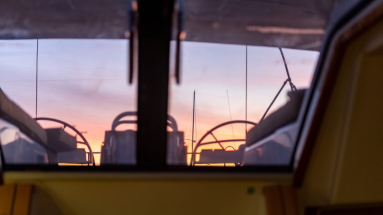 It is cold out there this morning, so I decided to take a sunrise picture from the relative warmth inside the boat rather than bundle up and go topsides