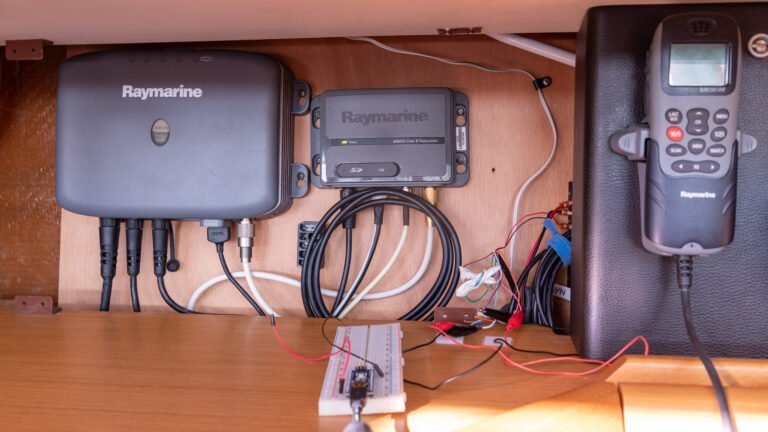 Debugging the colored NMEA outputs on the right with a small Arduino proved to be worth it as I figured out the issues - in the end it turned out that the documentation for AIS650 was incorrect and incomplete.