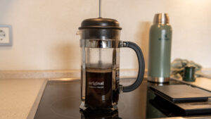 French Press coffee maker filled