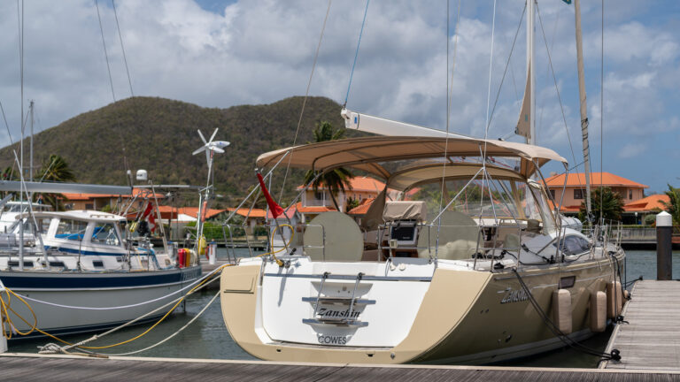Zanshin at the Rodney Bay docks with dodger and bimini put up