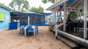 Tables set at the Paradise Beach Bar