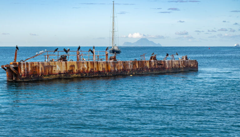 Rusty sunken dry-dock
