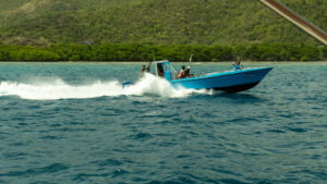 Fisherboat zipping past me